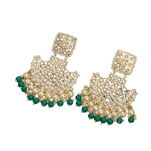 1. "Kundan channbali earrings with green and white pearls offer a regal, timeless allure."