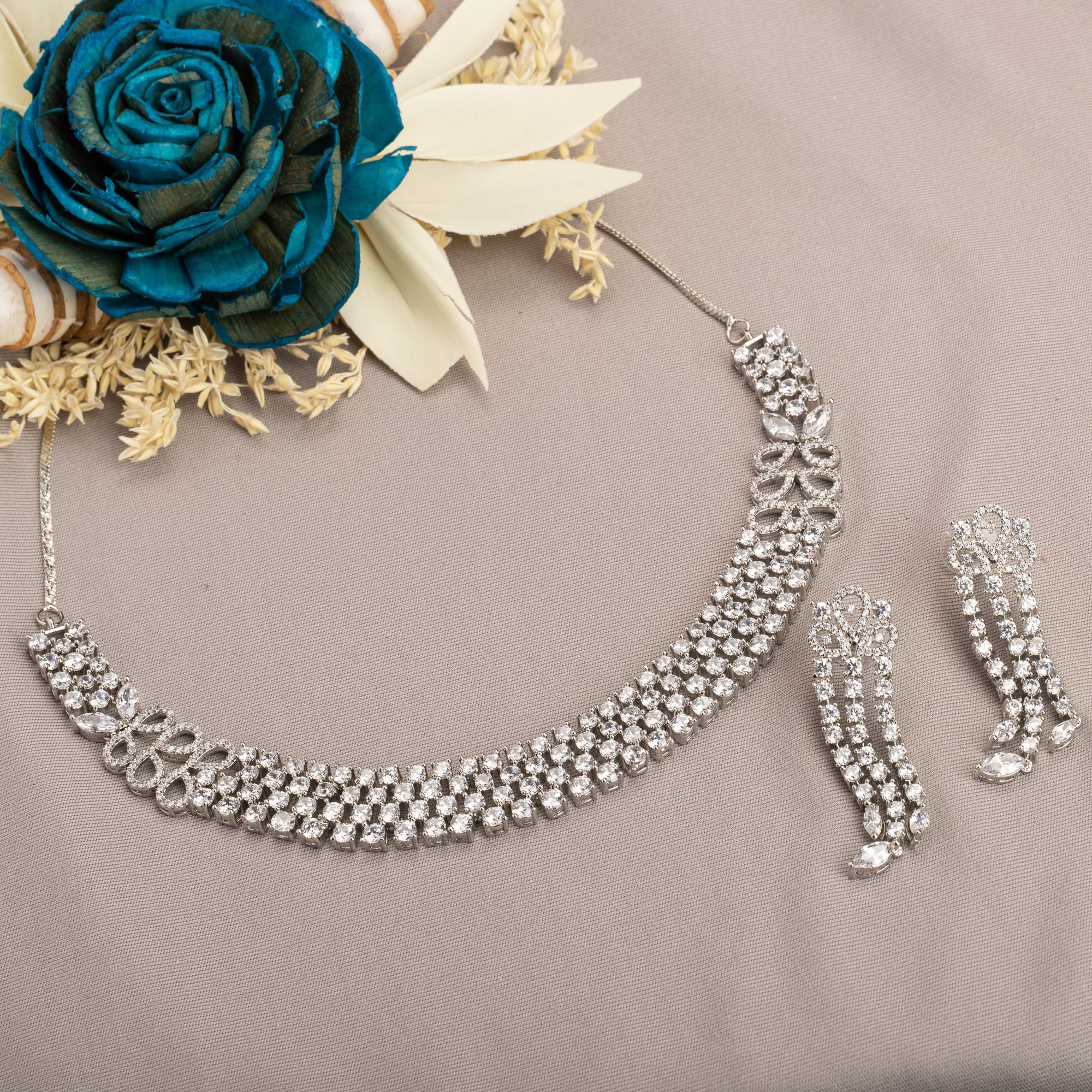 "Zircon necklace with infinity design symbolizes timeless elegance."