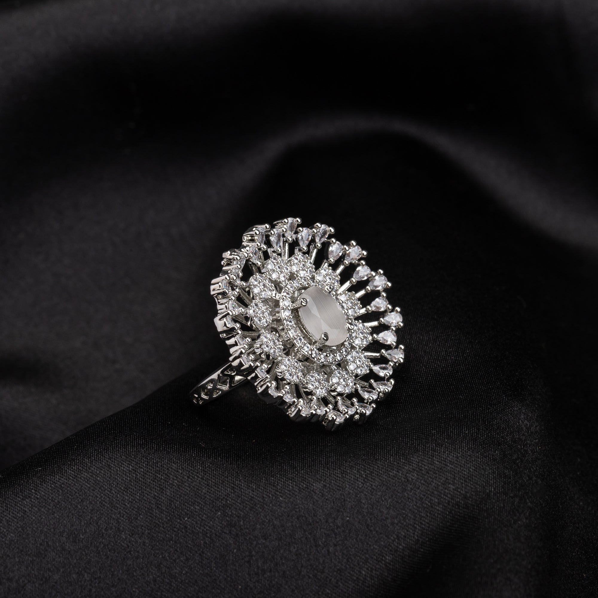Zircon finger ring with a green stone offers a refreshing and vibrant touch for casual wear.
