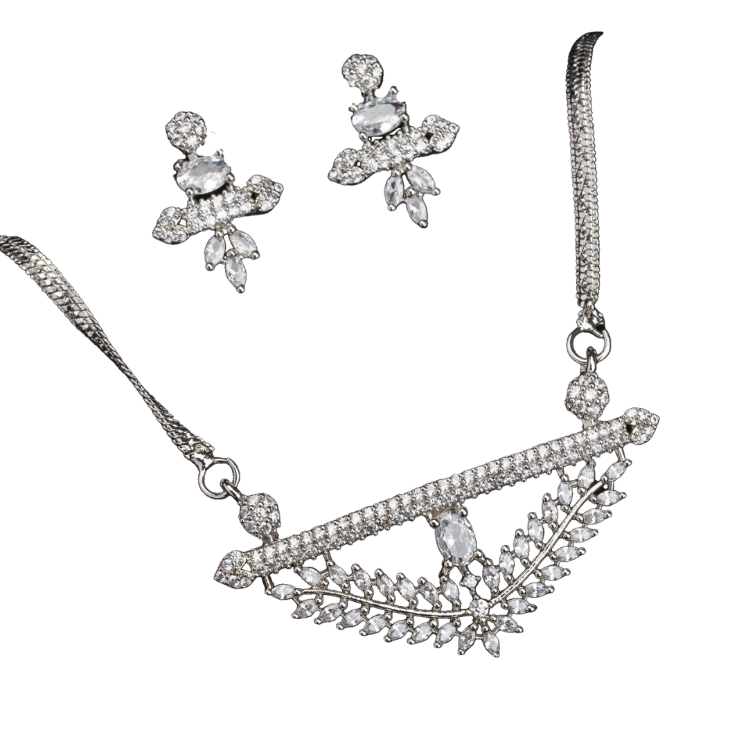 Silver zircon pendant set with matching earrings for refined elegance and luxury.