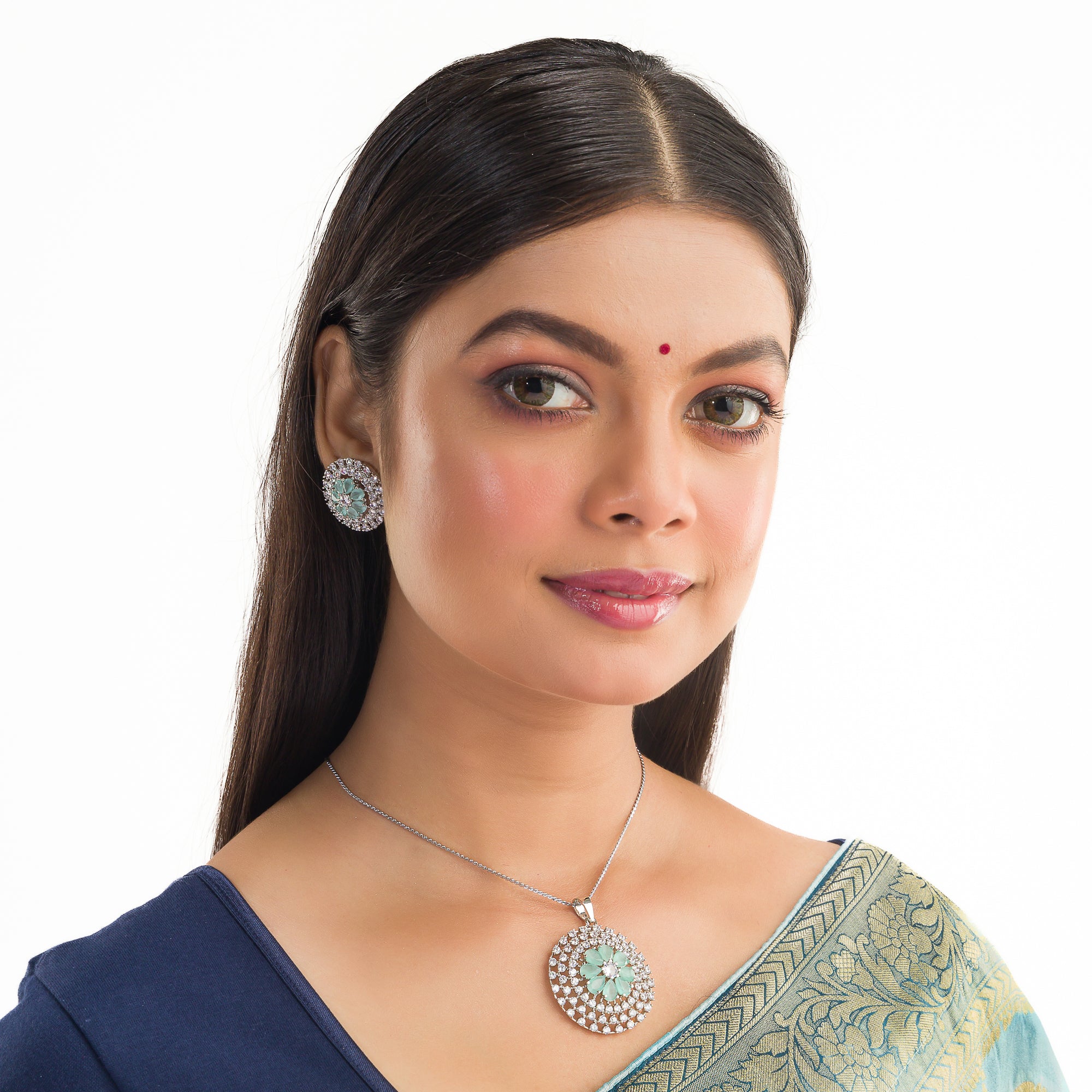 Floral zircon pendant set with turquoise and white stones, paired with matching earrings.