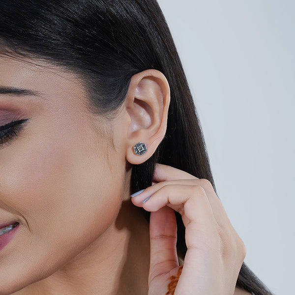 "925 sterling silver studs, timeless and versatile for elegant everyday wear."