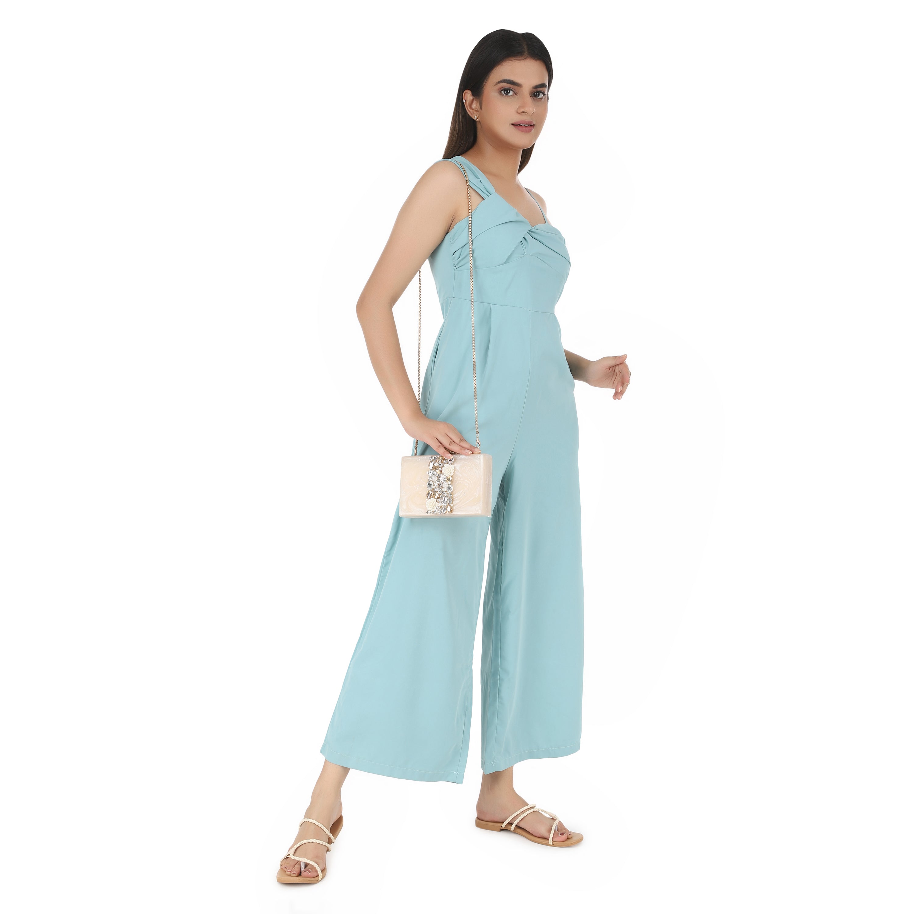 Embellished salmon resin clutch with extra pocket and sturdy sling for a chic and convenient style.