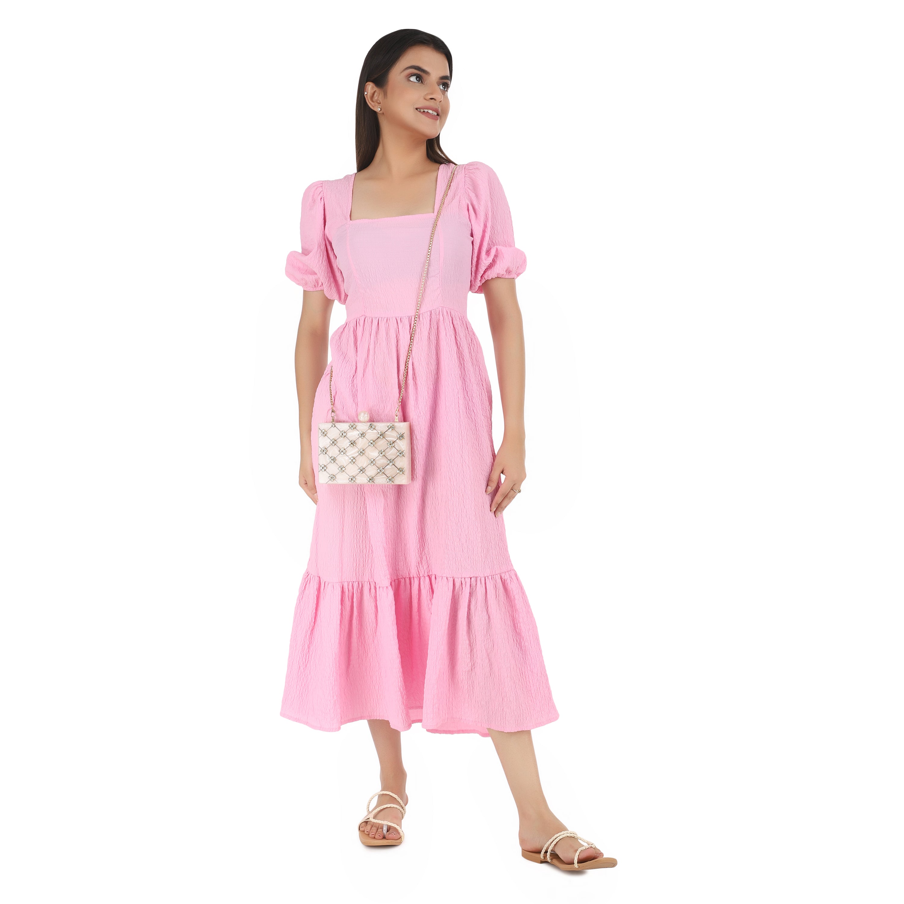 Beautifully crafted salmon resin clutch with exquisite details, perfect for showcasing your style.
