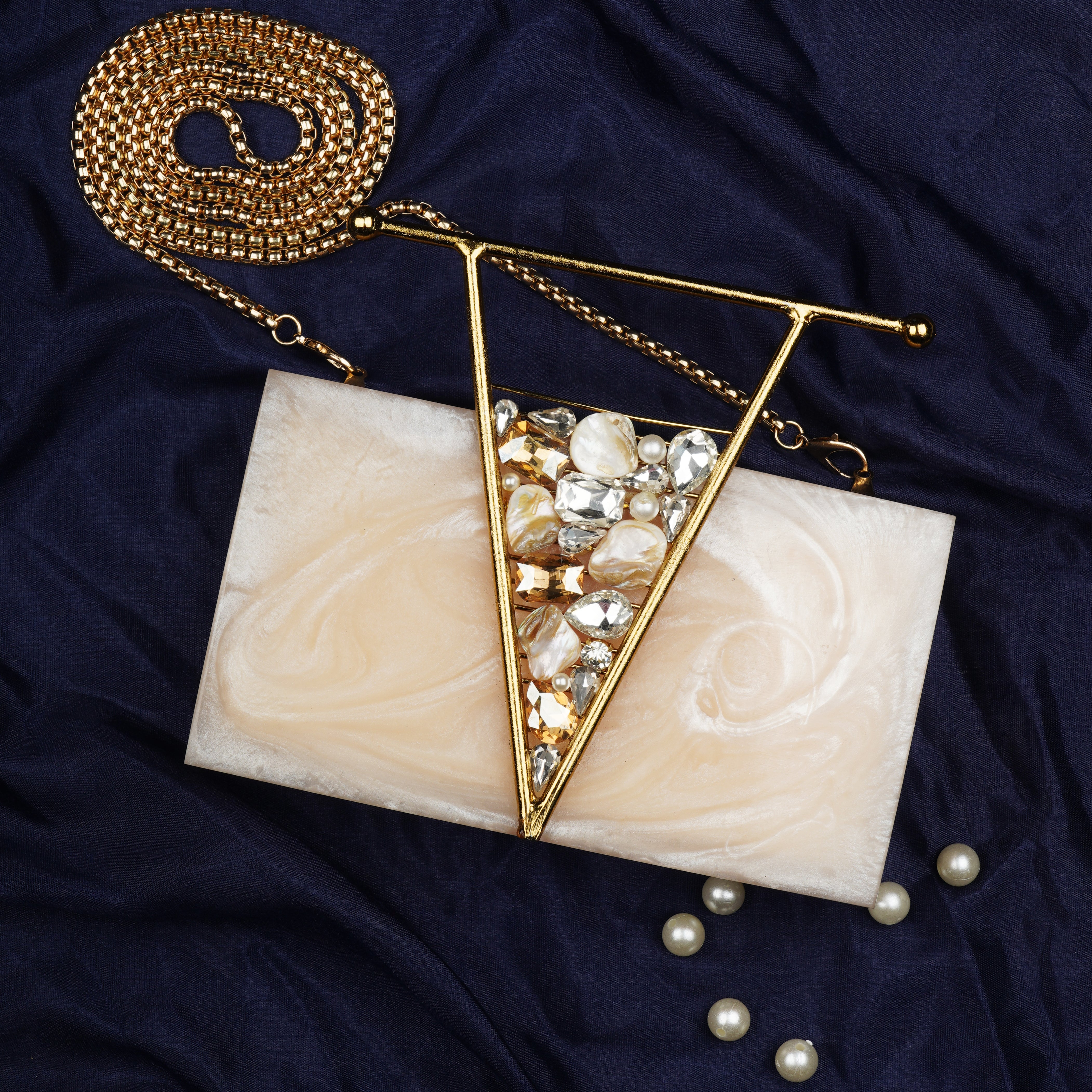Beautifully crafted salmon resin clutch with exquisite details, perfect for showcasing your style.