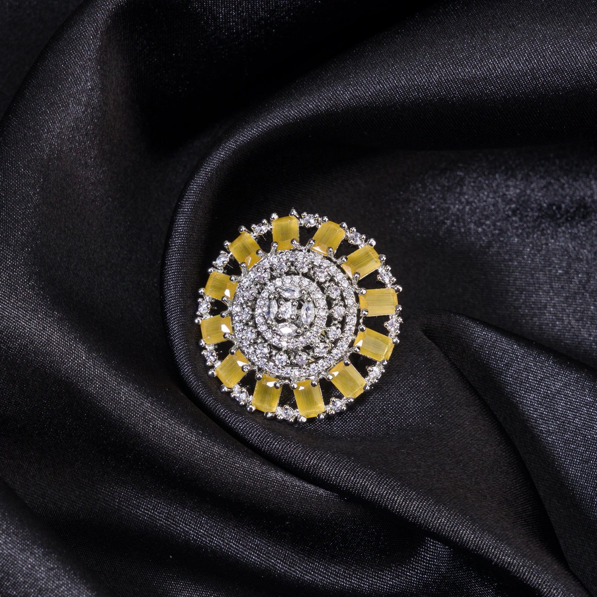 Yellow zircon finger ring with silver band, vibrant and eye-catching, ideal for party wear
