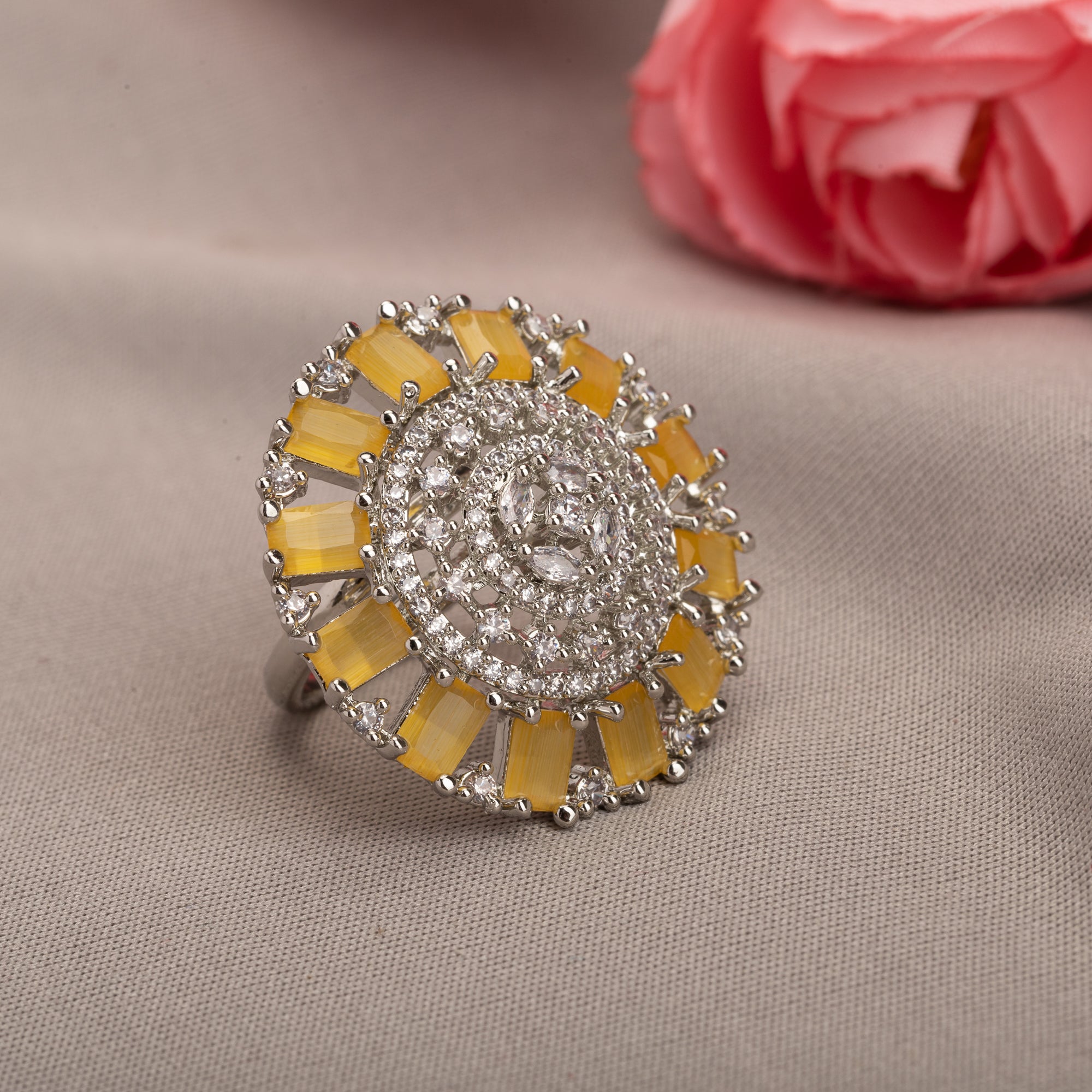 Yellow zircon finger ring with silver band, vibrant and eye-catching, ideal for party wear
