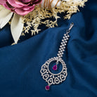 Pink zircon maang tika in silver, perfect for party wear, adding a chic touch of color and elegance
