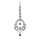 Pink zircon maang tika in silver, perfect for party wear, adding a chic touch of color and elegance
