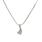 "Elegant zircon pendant set for neck and ear, perfect for casual wear, featuring a stylish '&' shape."
