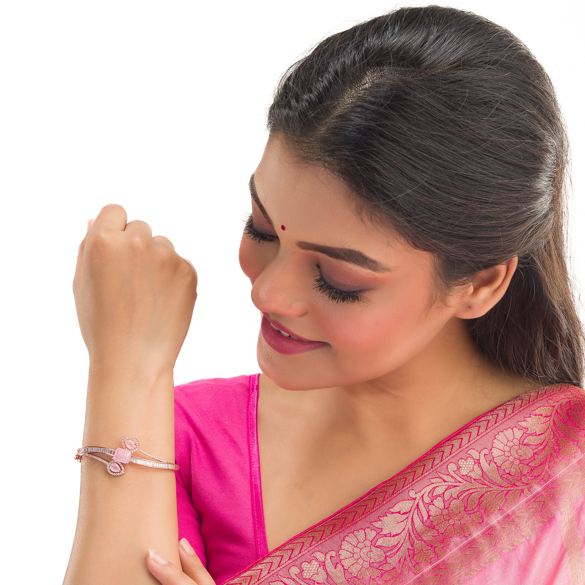 Stunning pink zircon bracelet in rosegold, perfect for party wear, offering a vibrant, chic look."
