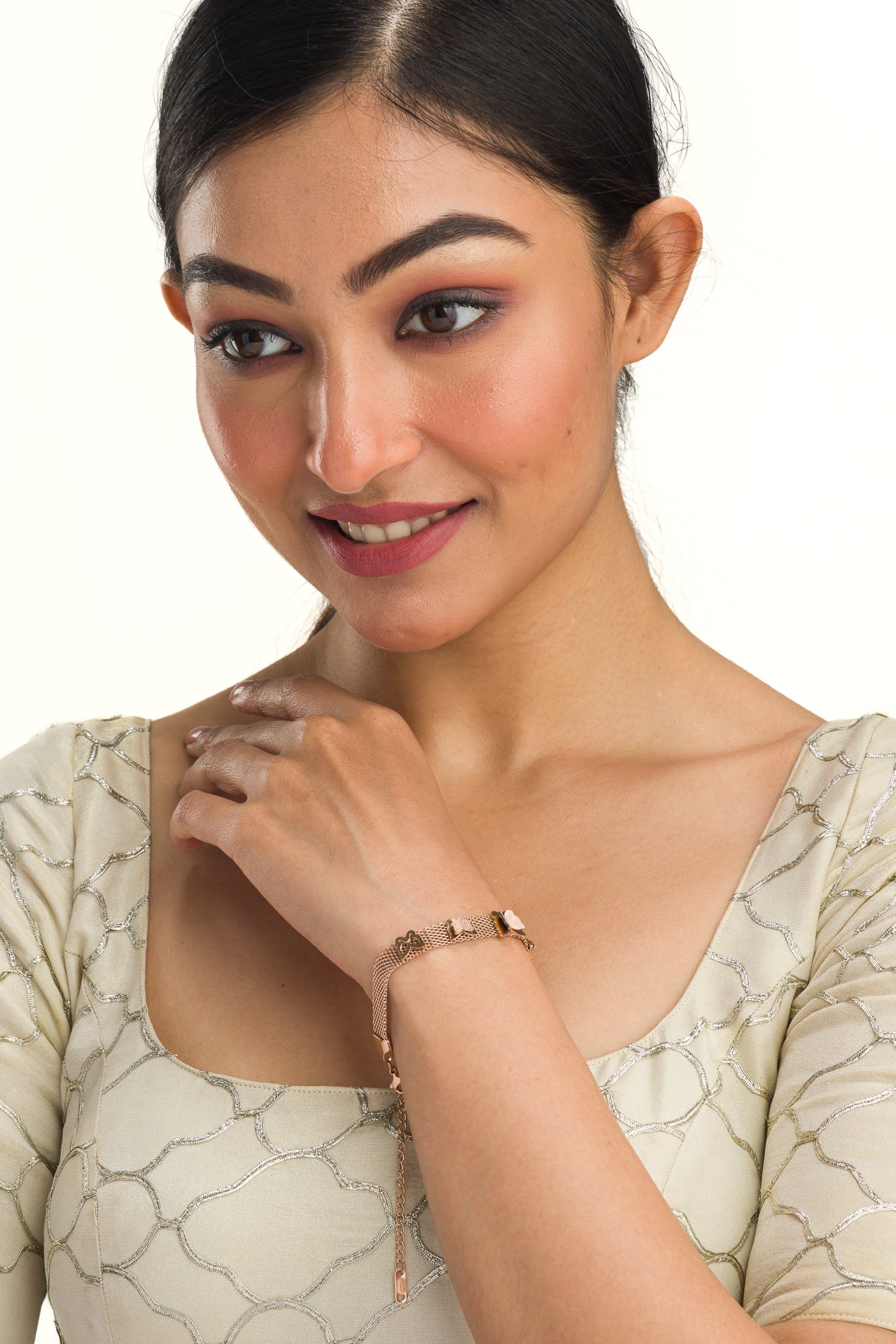 "Rosegold stainless steel bracelet with butterfly details, perfect for casual wear, adding a delicate touch."
