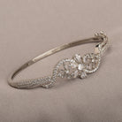 "Brilliant zircon bracelet in silver, showcasing dazzling clarity and gem-like radiance, ideal for party wear."

