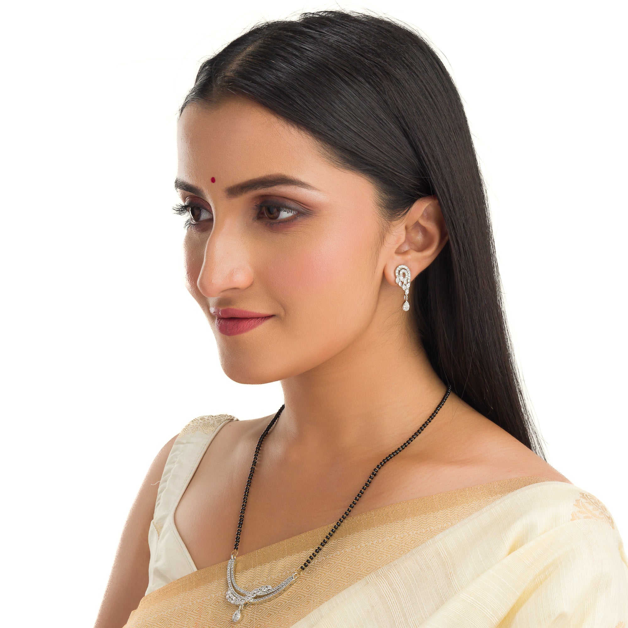 "Zircon mangalsutra in black and silver, blending traditional charm with radiant modern sparkle."
