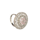 "Elegant zircon finger ring with a pink flower, offering sparkling charm and vibrant style."
