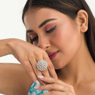 "Elegant zircon finger ring with a pink flower, offering sparkling charm and vibrant style."
