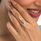 "Modern zircon finger ring in gold, featuring sleek design elements with sparkling elegance."
