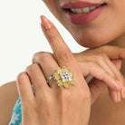 "Yellow zircon finger ring in silver, offering vibrant, sunny brilliance and golden charm for party wear."
