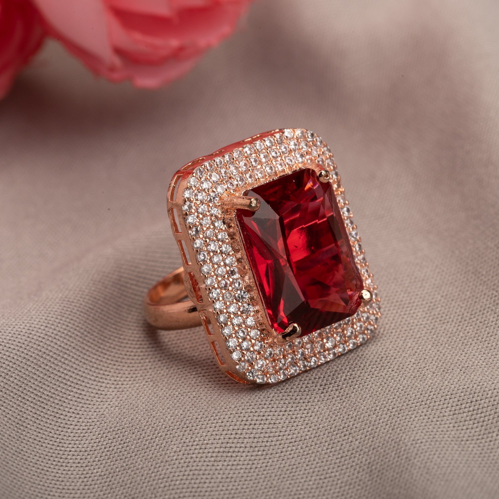"Dark red rose gold finger ring exudes sophisticated elegance with a rich, warm hue for party wear."
