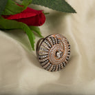"Rose gold zircon ring with black accents blends elegance and dramatic flair for party wear."

