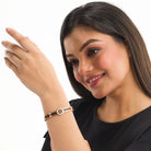 "Zircon bracelet with rose gold polish offers a sophisticated blend of sparkle and warmth for casual wear."
