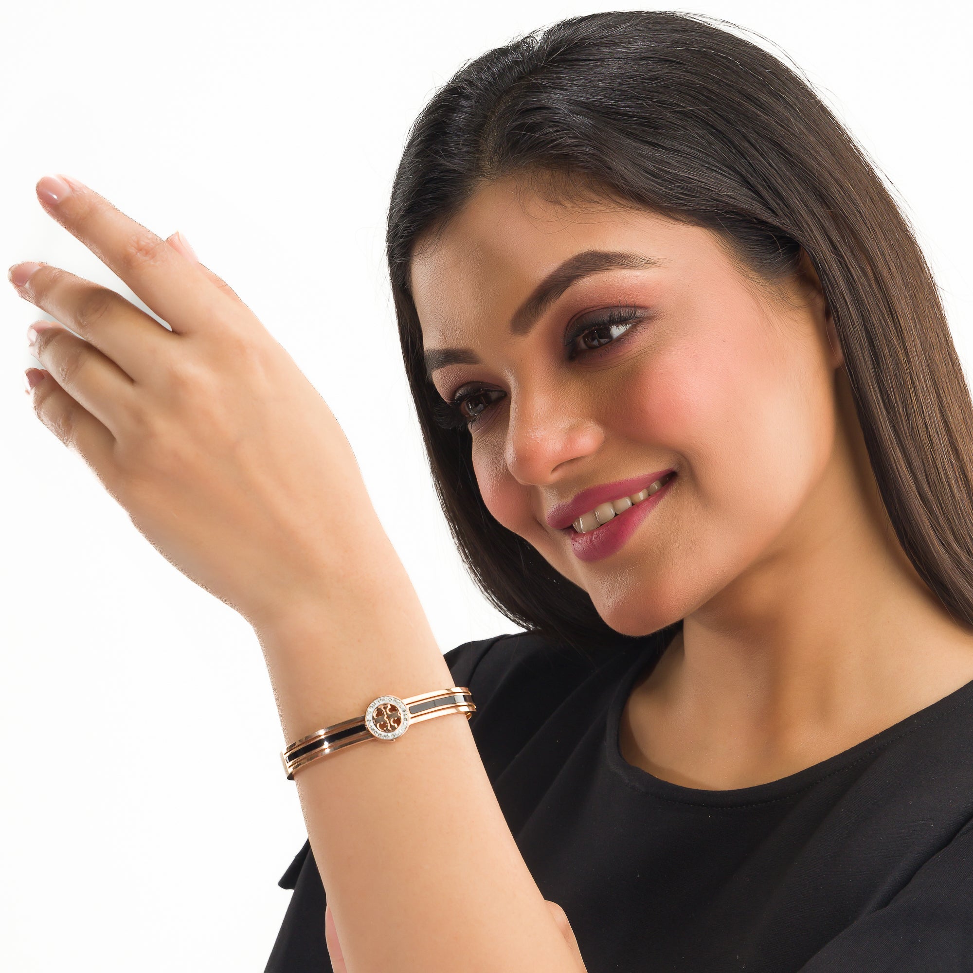 "Zircon bracelet with rose gold polish offers a sophisticated blend of sparkle and warmth for casual wear."
