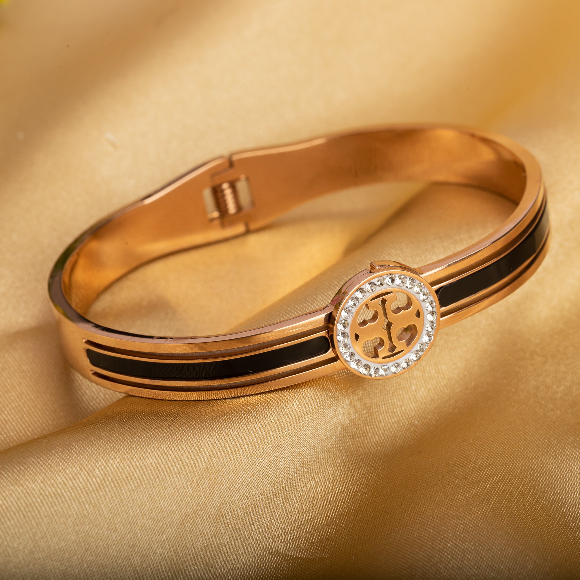 "Zircon bracelet with rose gold polish offers a sophisticated blend of sparkle and warmth for casual wear."
