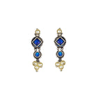 "Zircon stud earrings in silver offer intricate detailing and radiant sparkle for a traditional, elegant party wear look."
