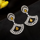 1. Yellow zircon earrings paired with clear zircon create a dazzling contrast of vibrant and sparkling brilliance for party wear.

