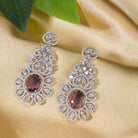 1. "Trendy purple zircon long earrings combine modern chic with sparkling elegance."

