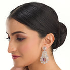 1. "Trendy purple zircon long earrings combine modern chic with sparkling elegance."
