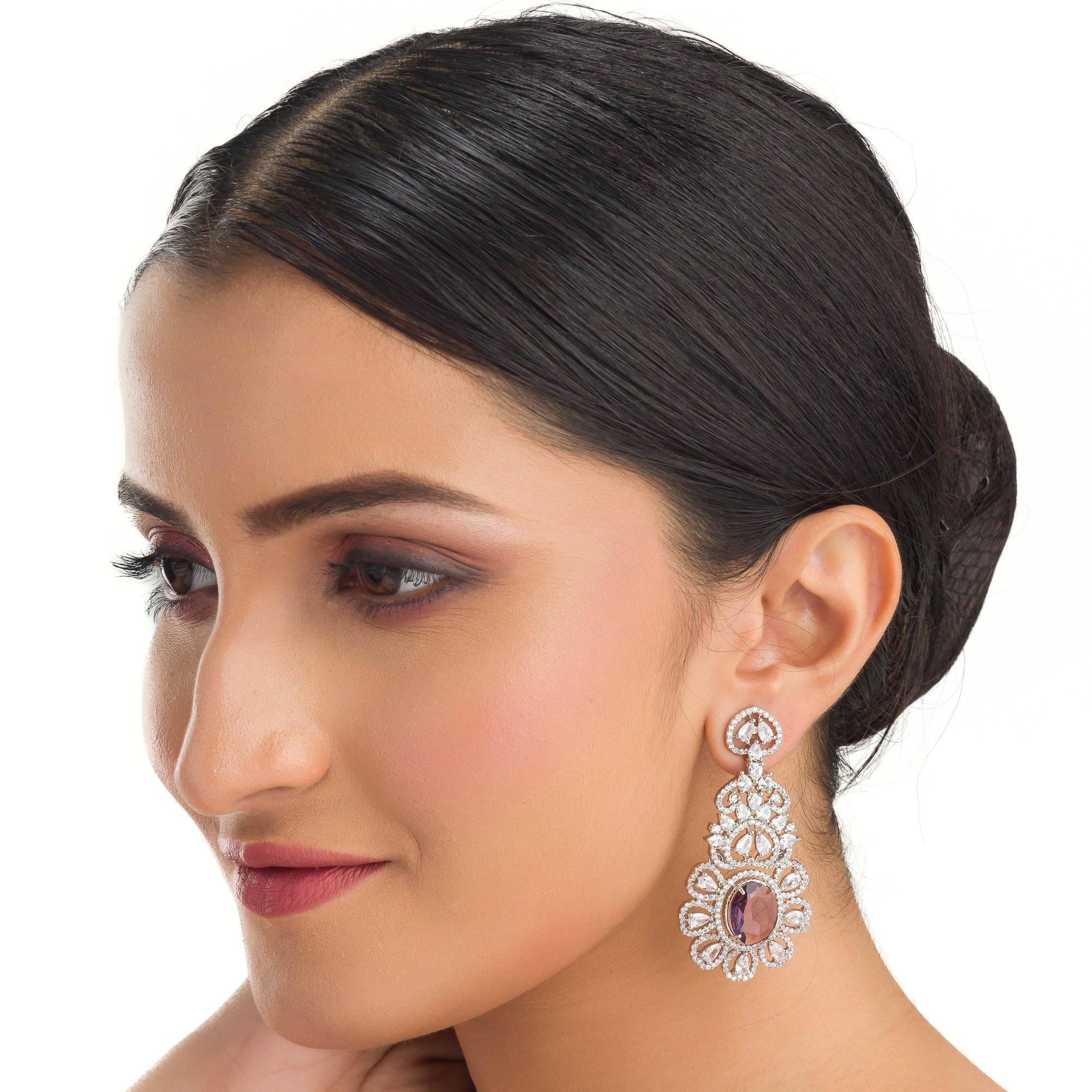 1. "Trendy purple zircon long earrings combine modern chic with sparkling elegance."
