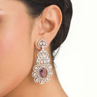 1. "Trendy purple zircon long earrings combine modern chic with sparkling elegance."
