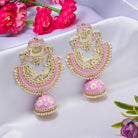 "Oversized pink jhumka with intricate detailing adds a bold, elegant touch to any outfit."

