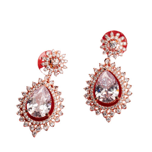 "Rose gold zircon earrings add elegance and sparkle to any look with timeless shine."
