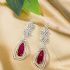 "Light pink zircon earrings offer a delicate sparkle with a serene, elegant touch."
