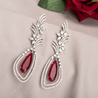 "Light pink zircon earrings offer a delicate sparkle with a serene, elegant touch."
