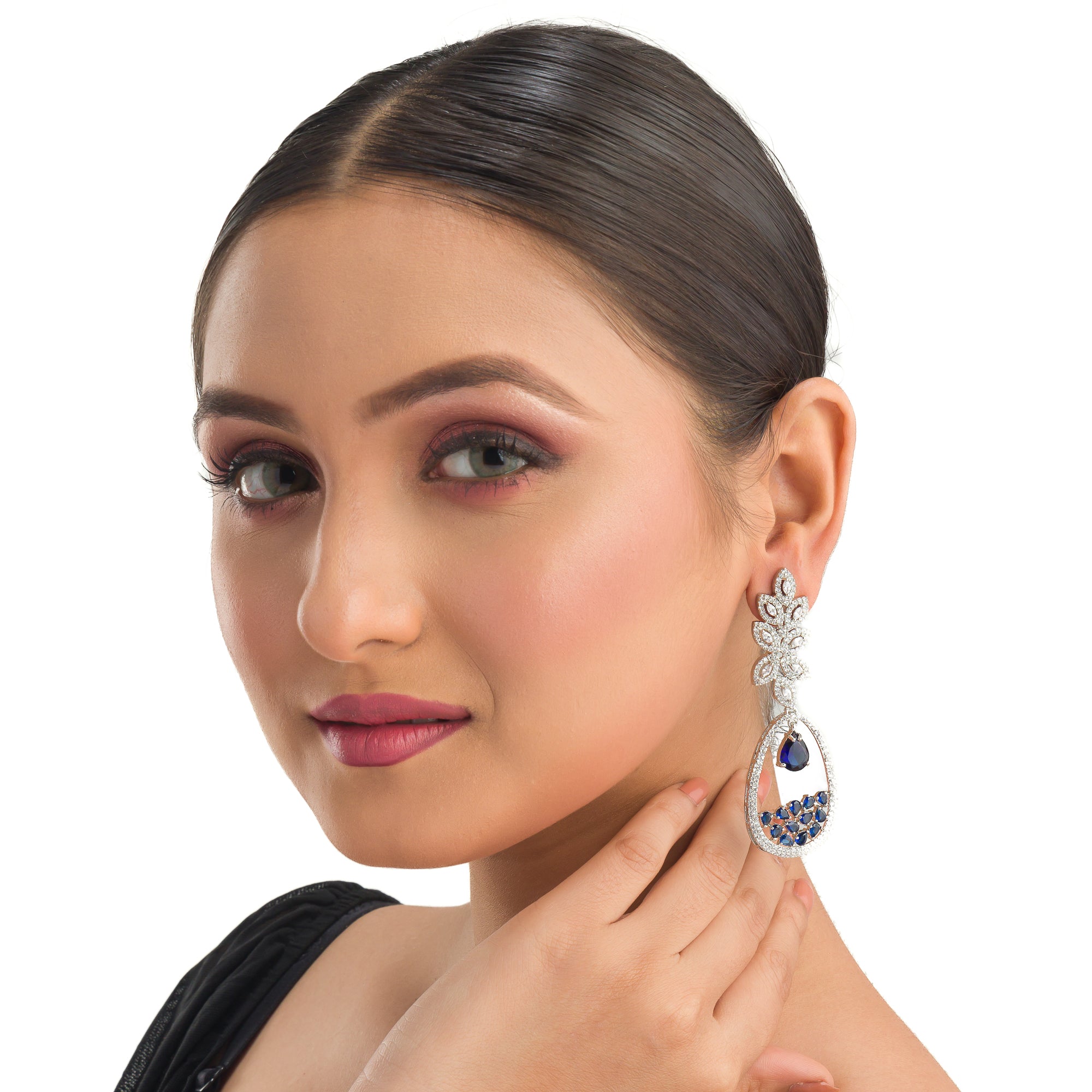 1. "Light blue zircon earrings offer a fresh, delicate sparkle with serene elegance."
