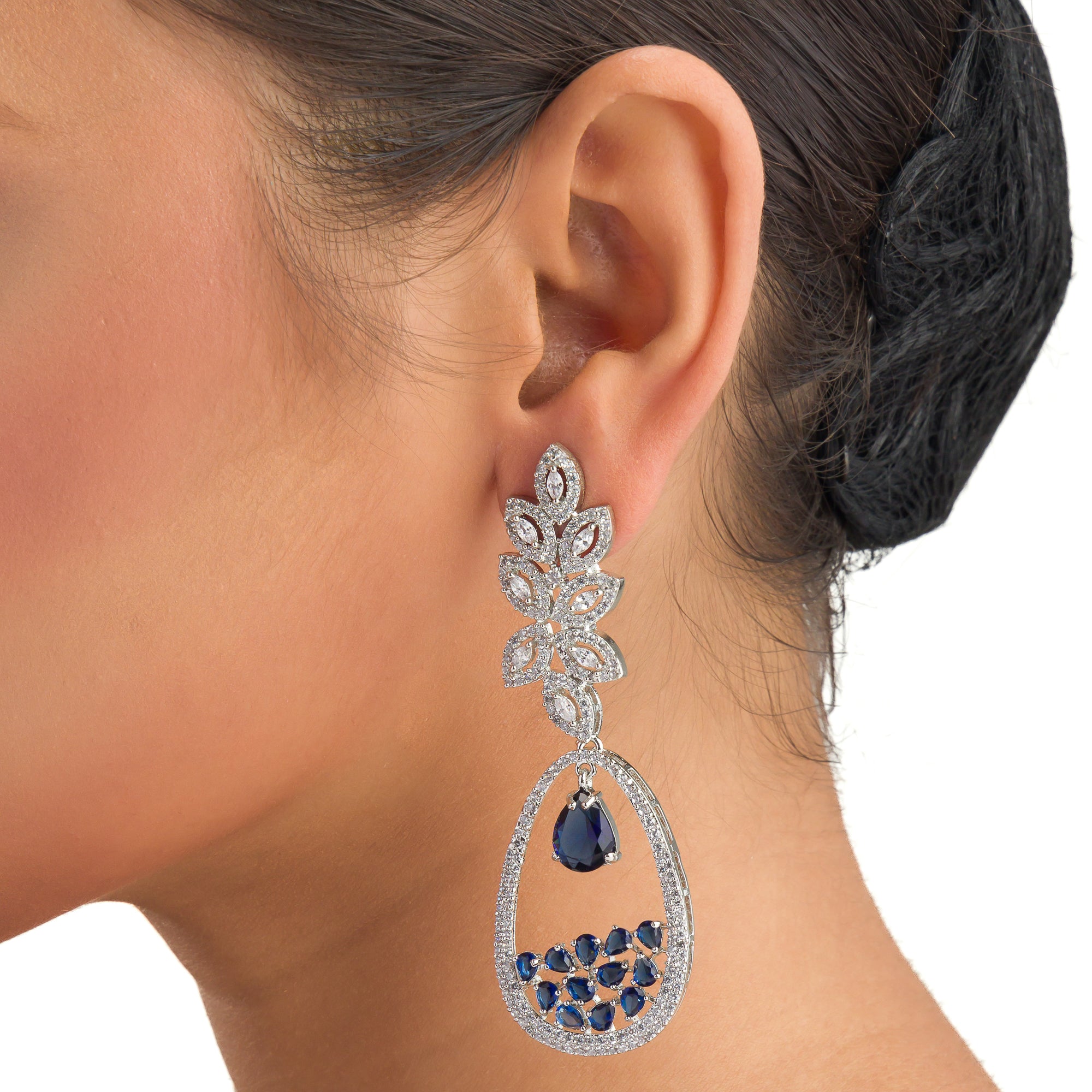1. "Light blue zircon earrings offer a fresh, delicate sparkle with serene elegance."
