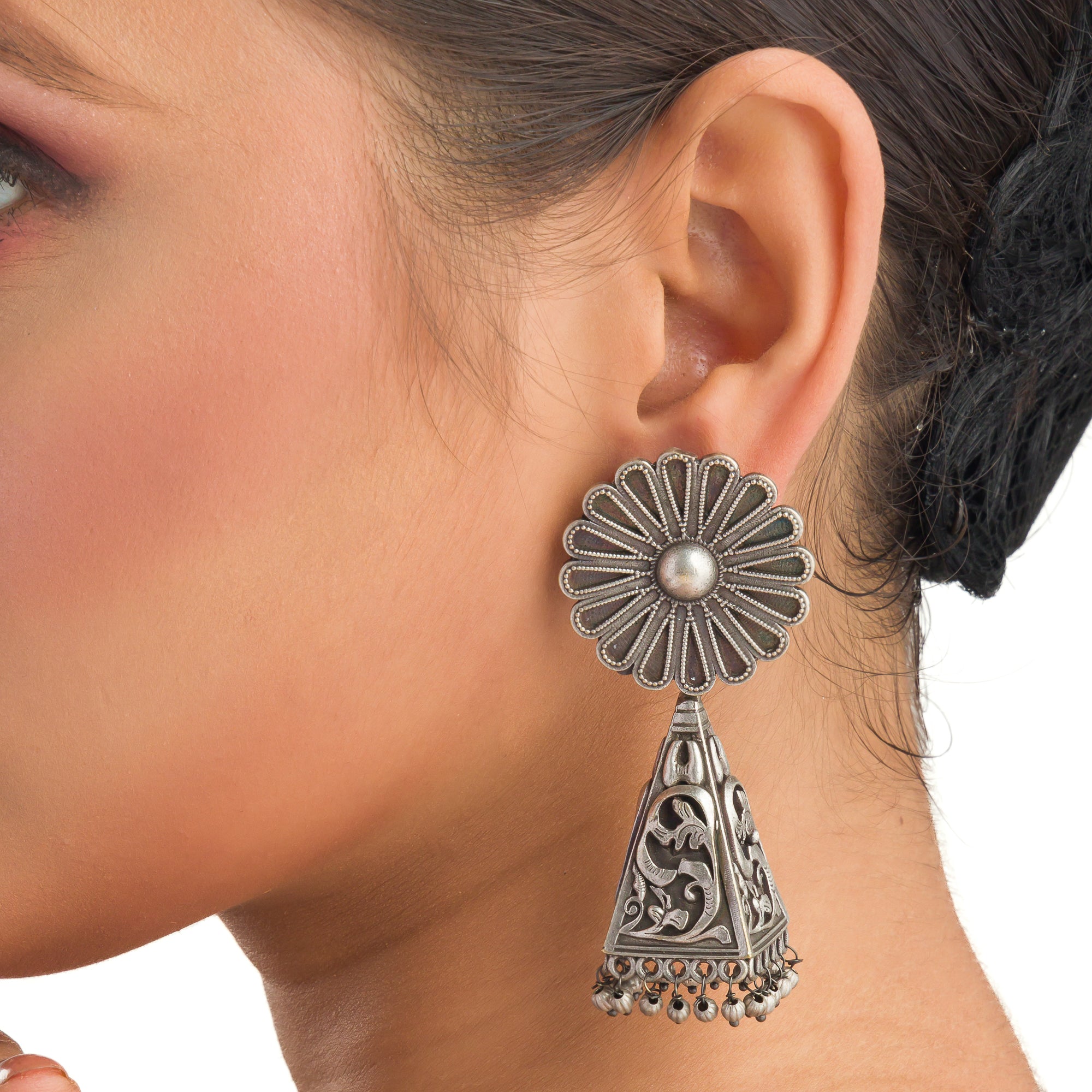 "Trendy oxidized earrings with a sleek, modern edge to elevate any outfit."
