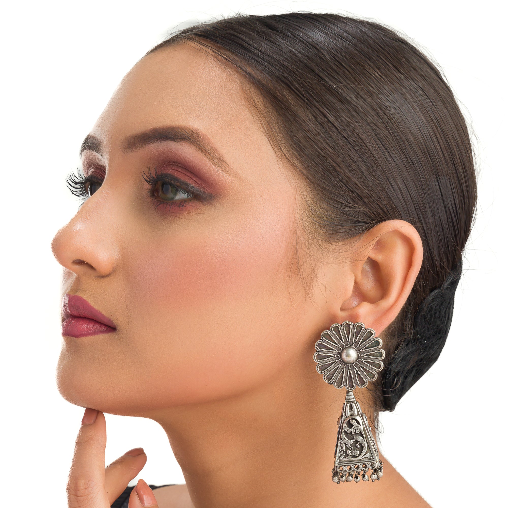"Trendy oxidized earrings with a sleek, modern edge to elevate any outfit."
