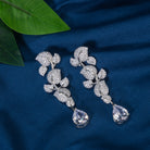 "Leaf design zircon earrings blend nature’s beauty with radiant zircon accents."
