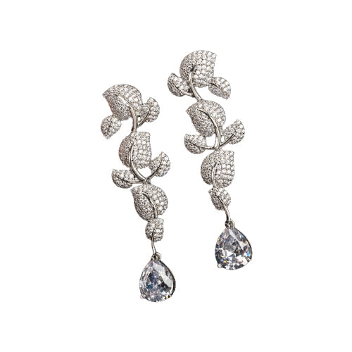 "Leaf design zircon earrings blend nature’s beauty with radiant zircon accents."
