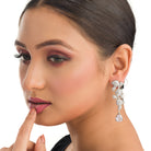 "Leaf design zircon earrings blend nature’s beauty with radiant zircon accents."
