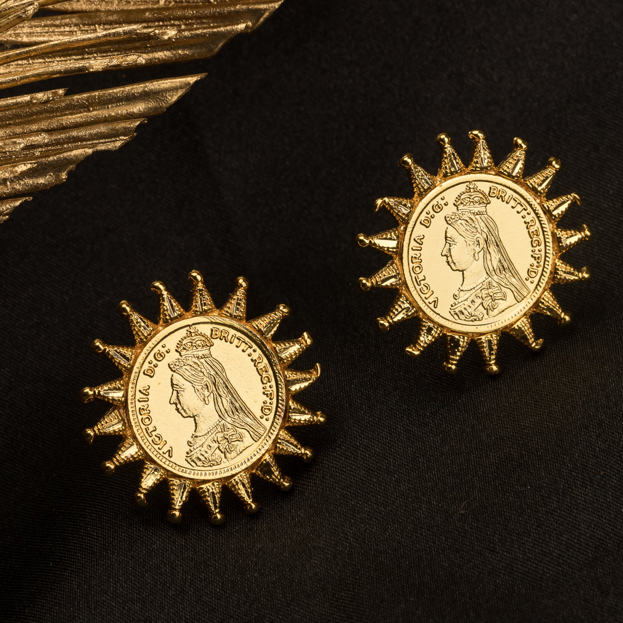 "Sun design Rani Victoria earrings mix regal elegance with timeless classic style."
