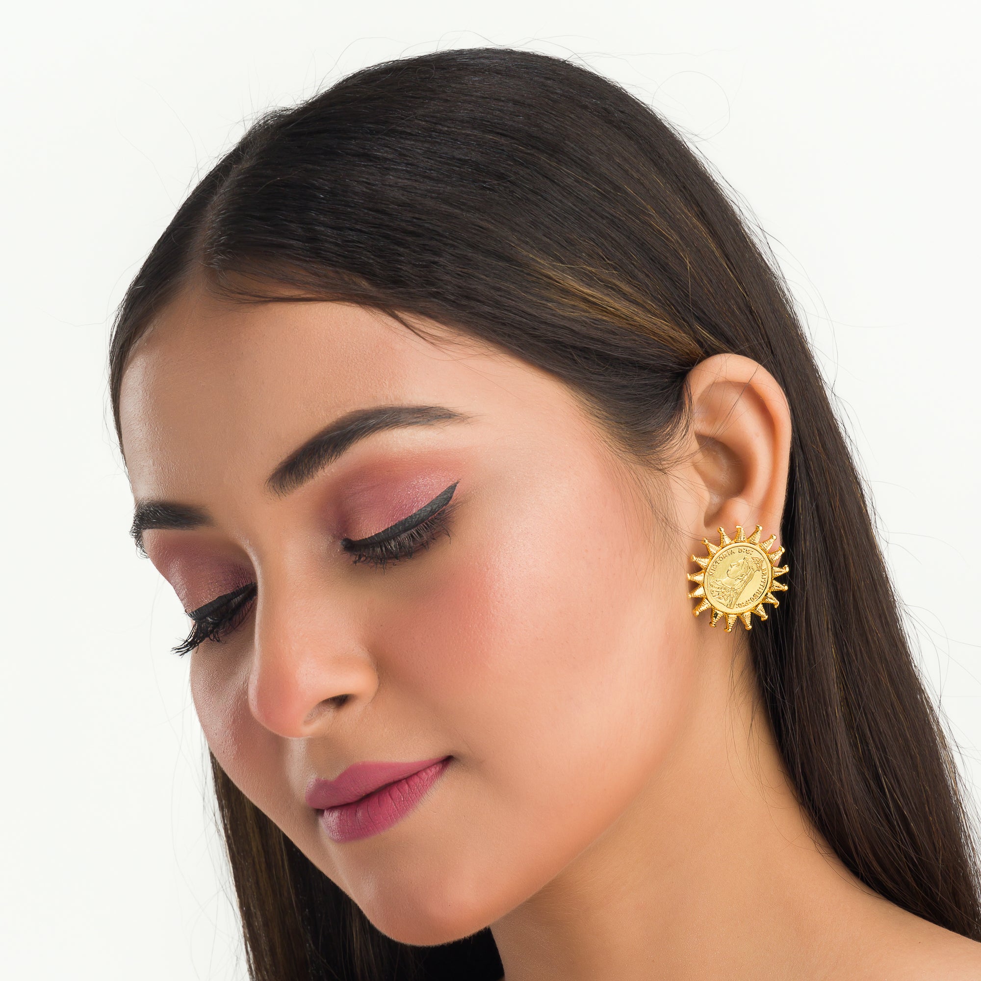 "Sun design Rani Victoria earrings mix regal elegance with timeless classic style."
