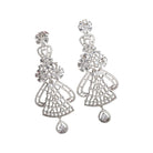 "Zircon dangler earrings sparkle with deep, captivating brilliance, perfect for any occasion."
