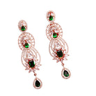 Green and white zircon earrings with rose gold polish exude vibrant elegance and style."
