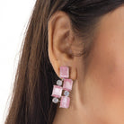 "Pink zircon heavy necklace boasts striking brilliance and bold elegance."
