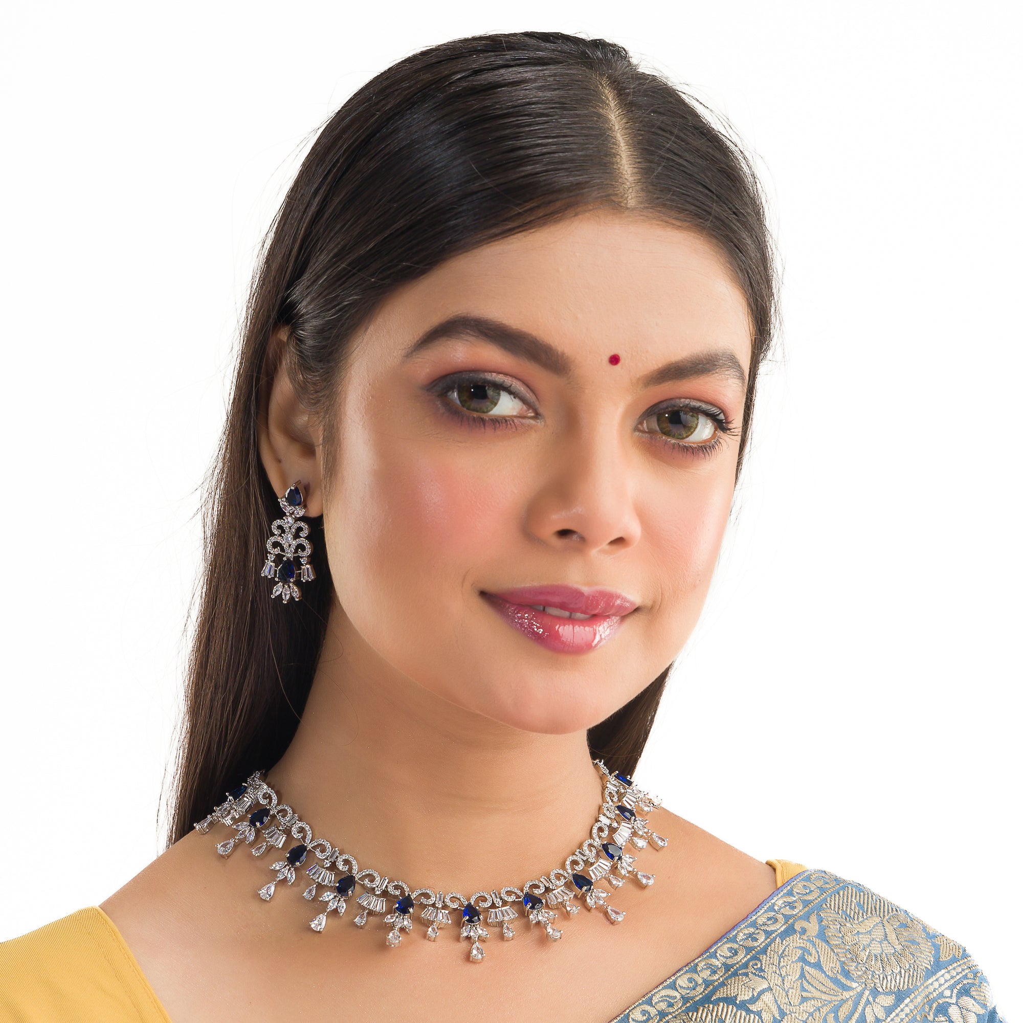 "Navy blue zircon necklace offers a sophisticated splash of color and sparkle."
